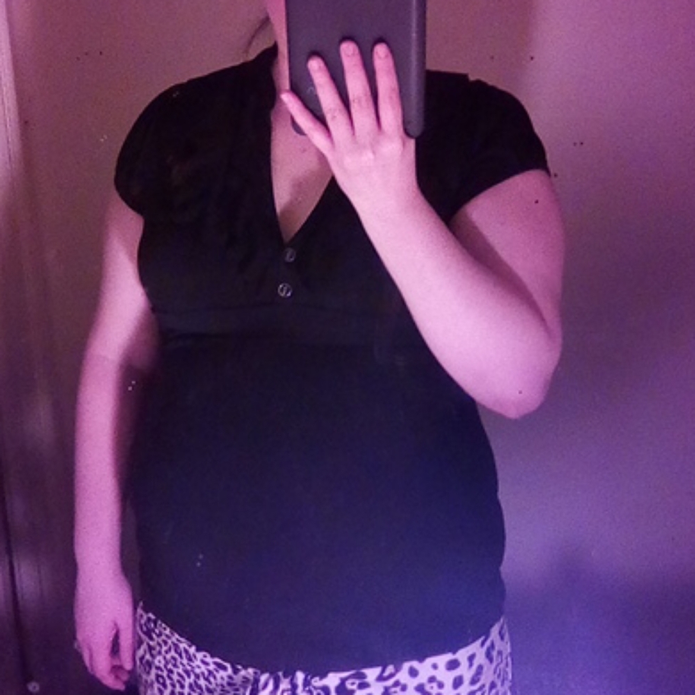 Black frilly button top